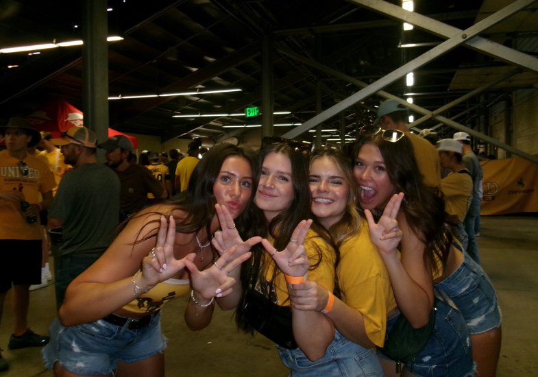 Makena and friends on gameday 