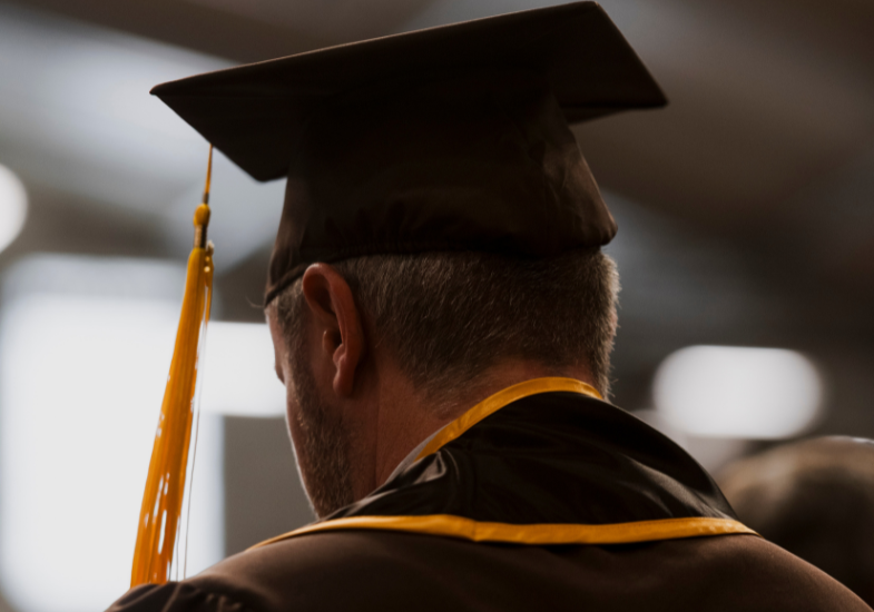 gradaute wearing cap and gown