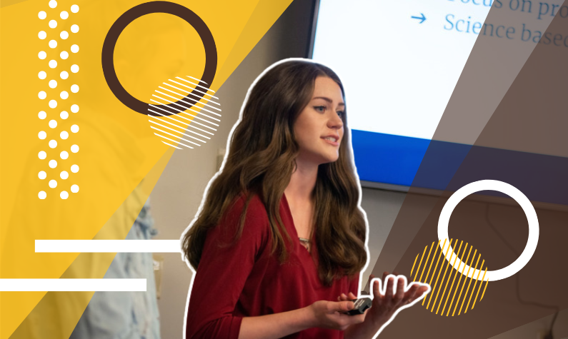 A student presenting in a classroom
