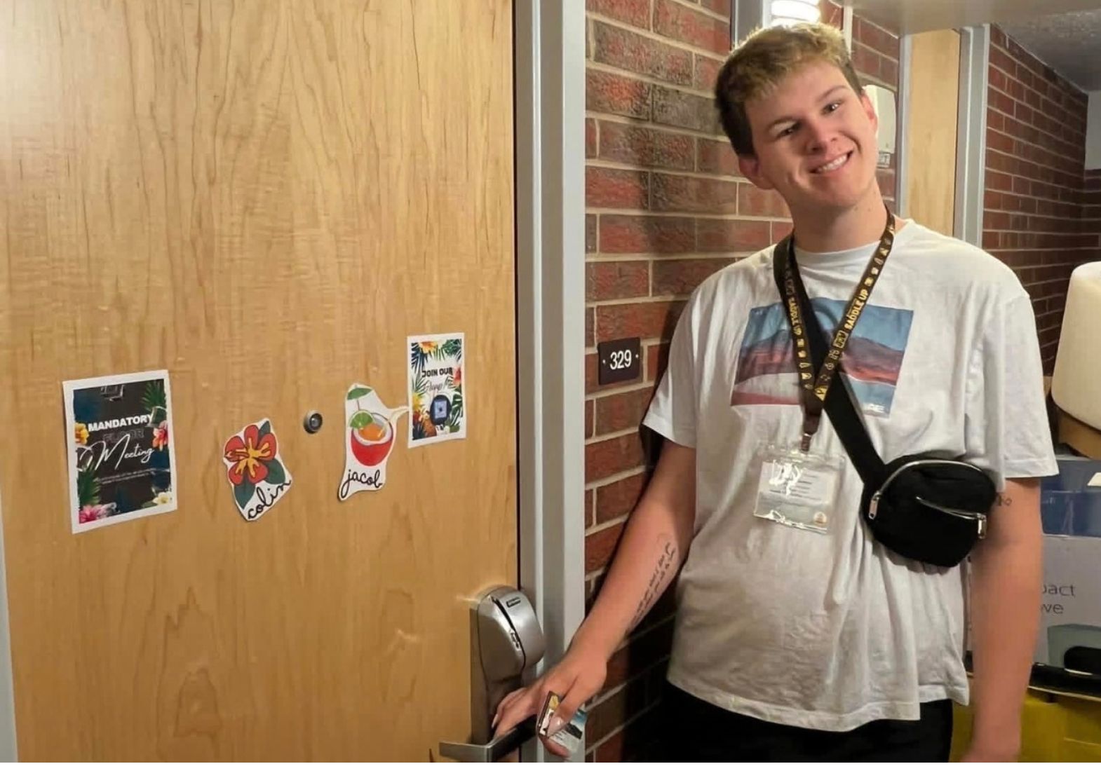 Freshman Colin walking into his dorm room for the first time