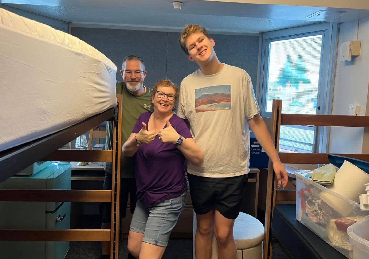 Colins family helping him move in