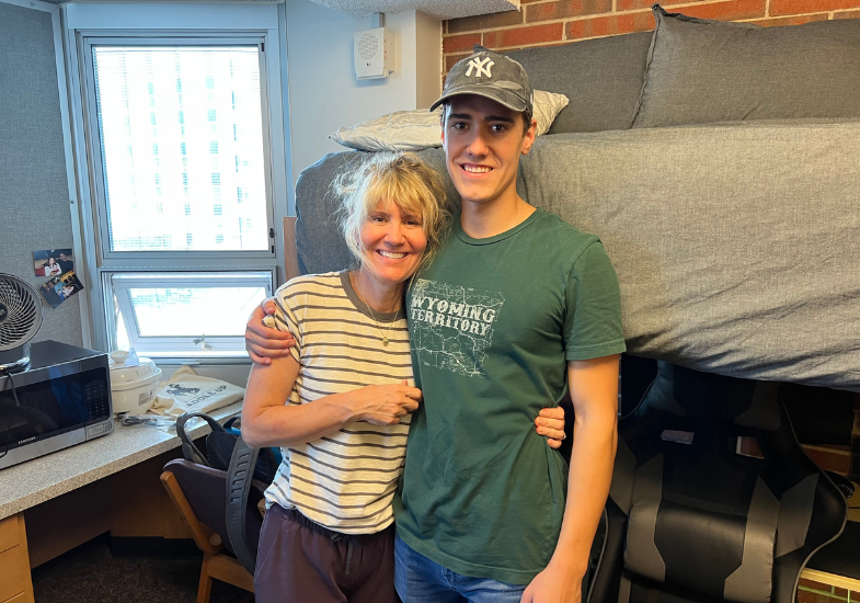 Sam moving into his dorm room