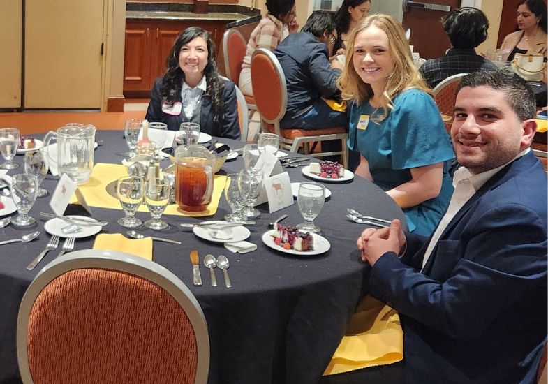 authors table practicing converstation and etiquette over dessert