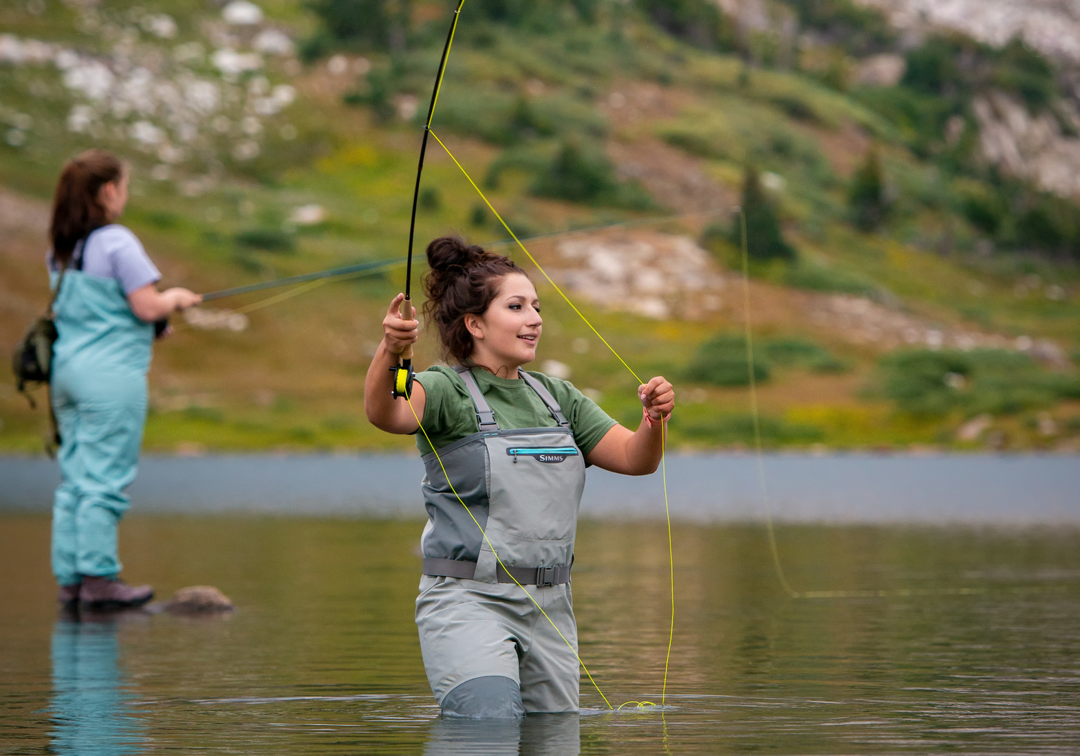 students fly fishing