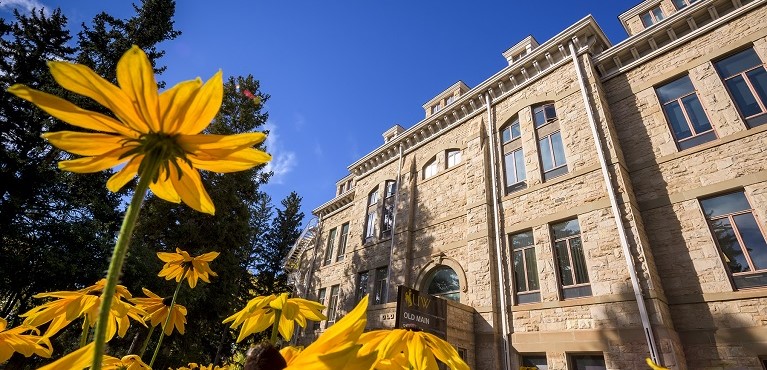 A button with an image of flowers in front of Old Main that takes you to the Financial Affairs page