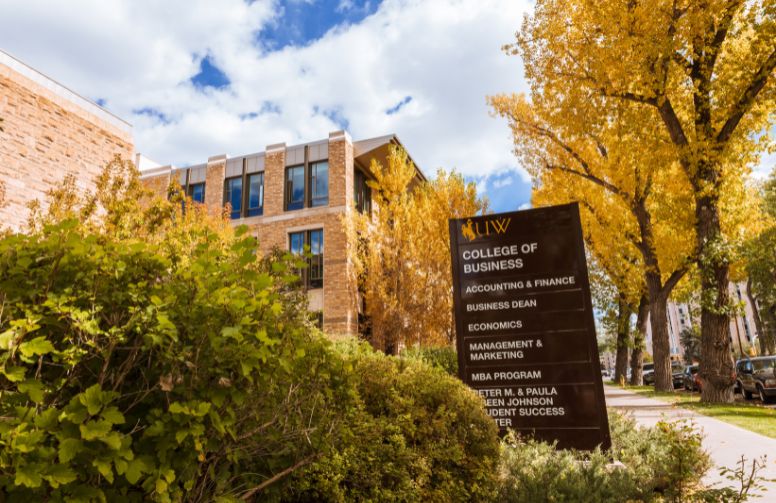 exterior of the College of Business in the fall.