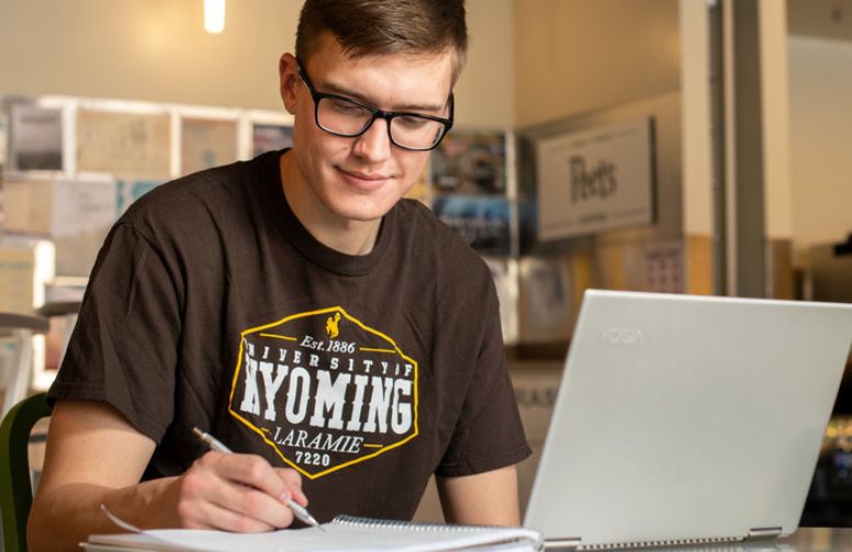 A student taking notes.