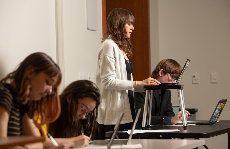 a student working on a laptop