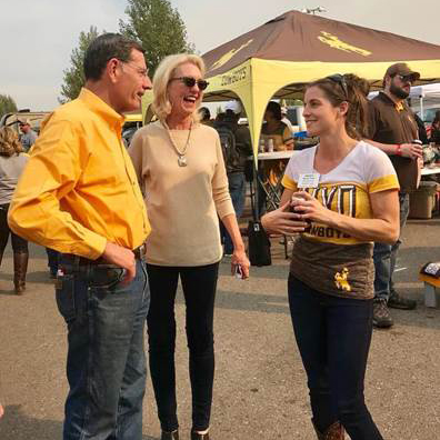 Fabel speaking with two people