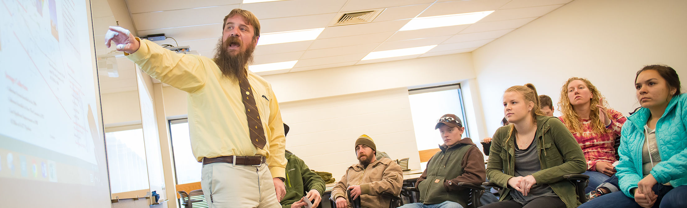 Ryan Kobbe explains concepts to an engineering class.