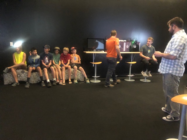 Jared teaches students how to use the 3D Cave