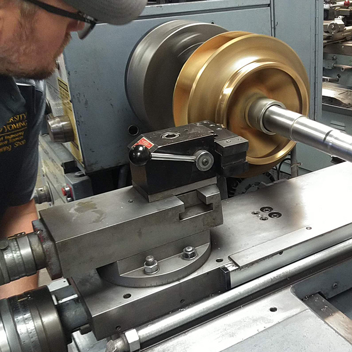 Turning and polishing bronze pump seal riding surface for UW Central Energy Plant