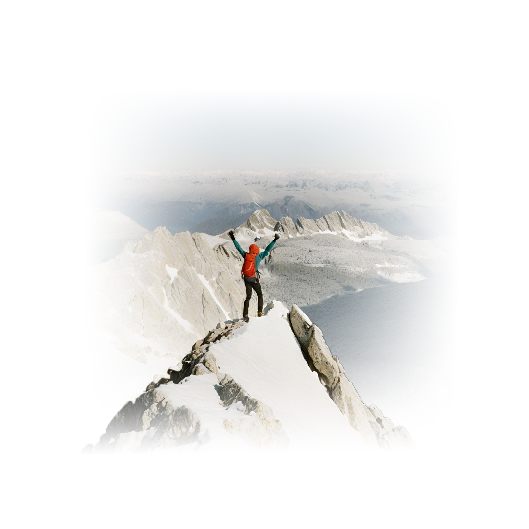 hiker summits mountain