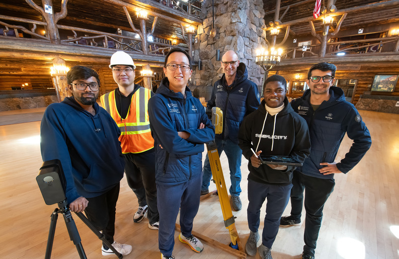 Team of engineers standing and smiling