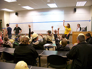 boy scouts raising hands