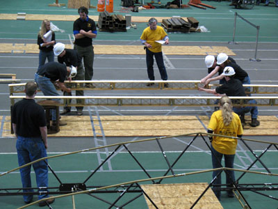 Students working on bridge competition - building the structure