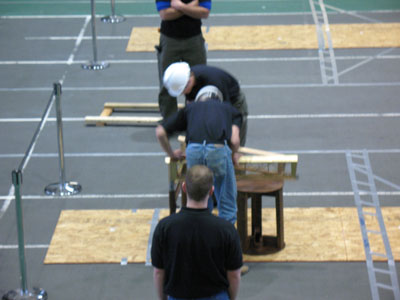 Students working on bridge competition - measuring intitial pieces