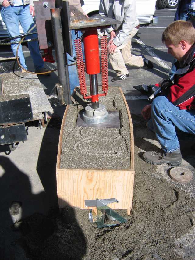 The final load was 2.9 tons before the tunnel collapsed enough to stop the laser beam.