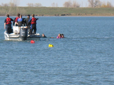 The canoe after being swamped by the rescue boat