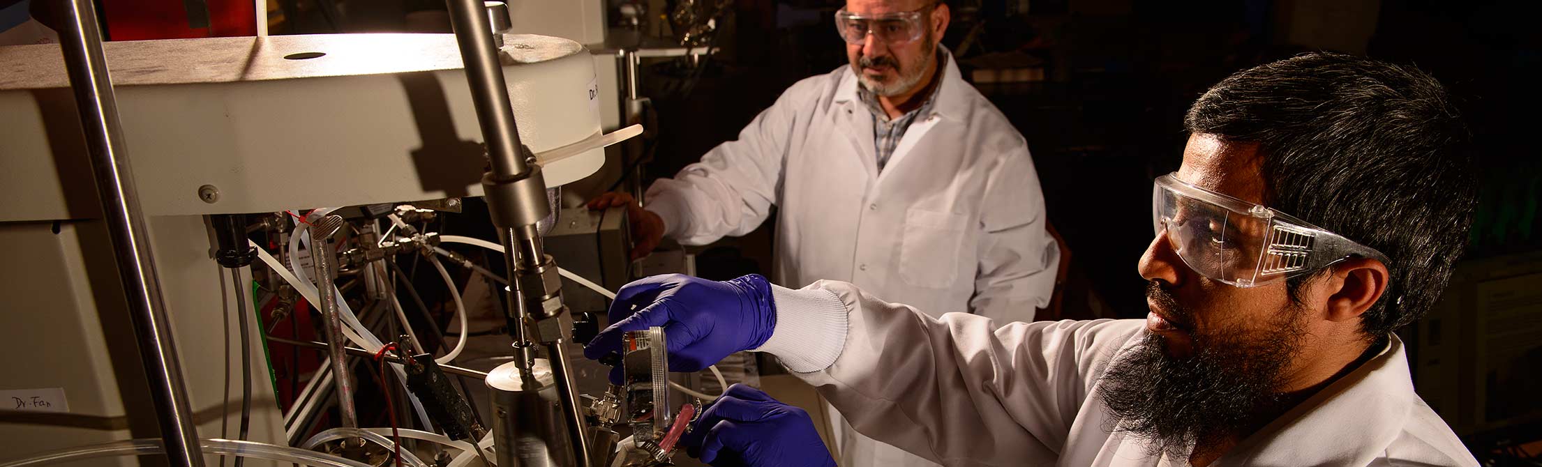 Petroleum engineering students test materials.