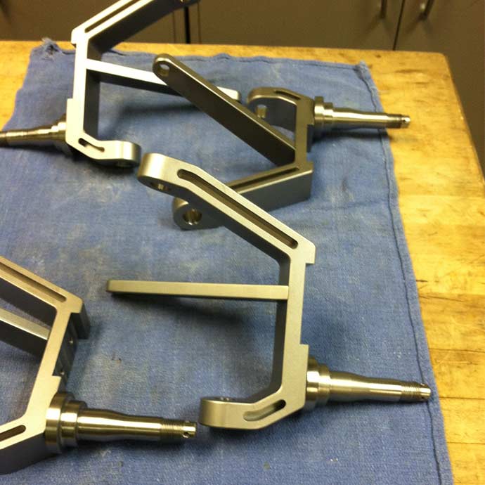 Metal pieces on table