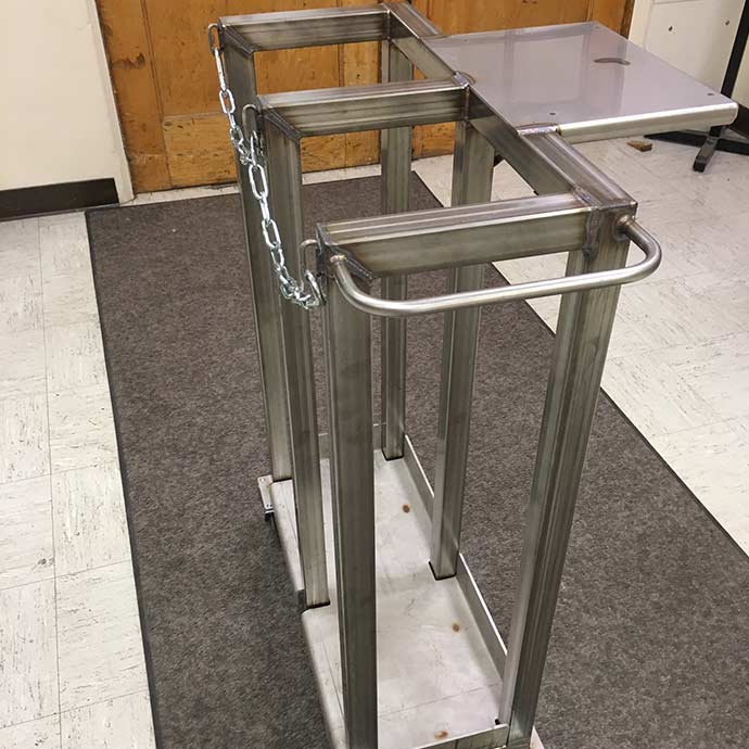 Metal cart on floor