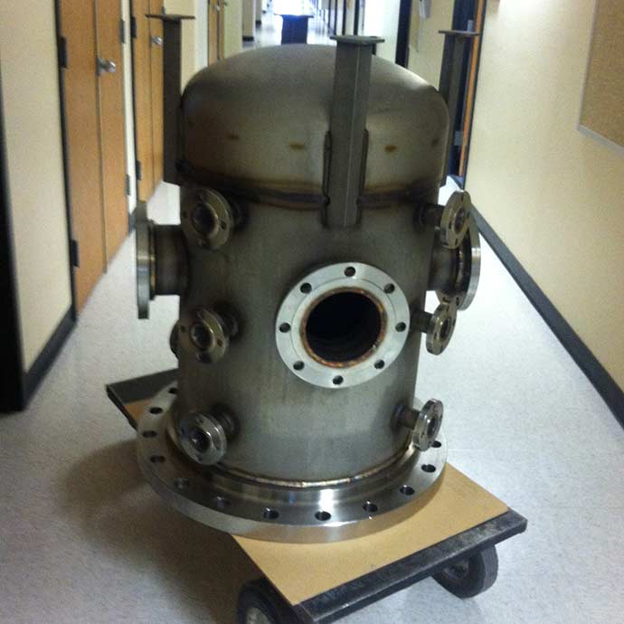 Metal combustion chamber on dolly