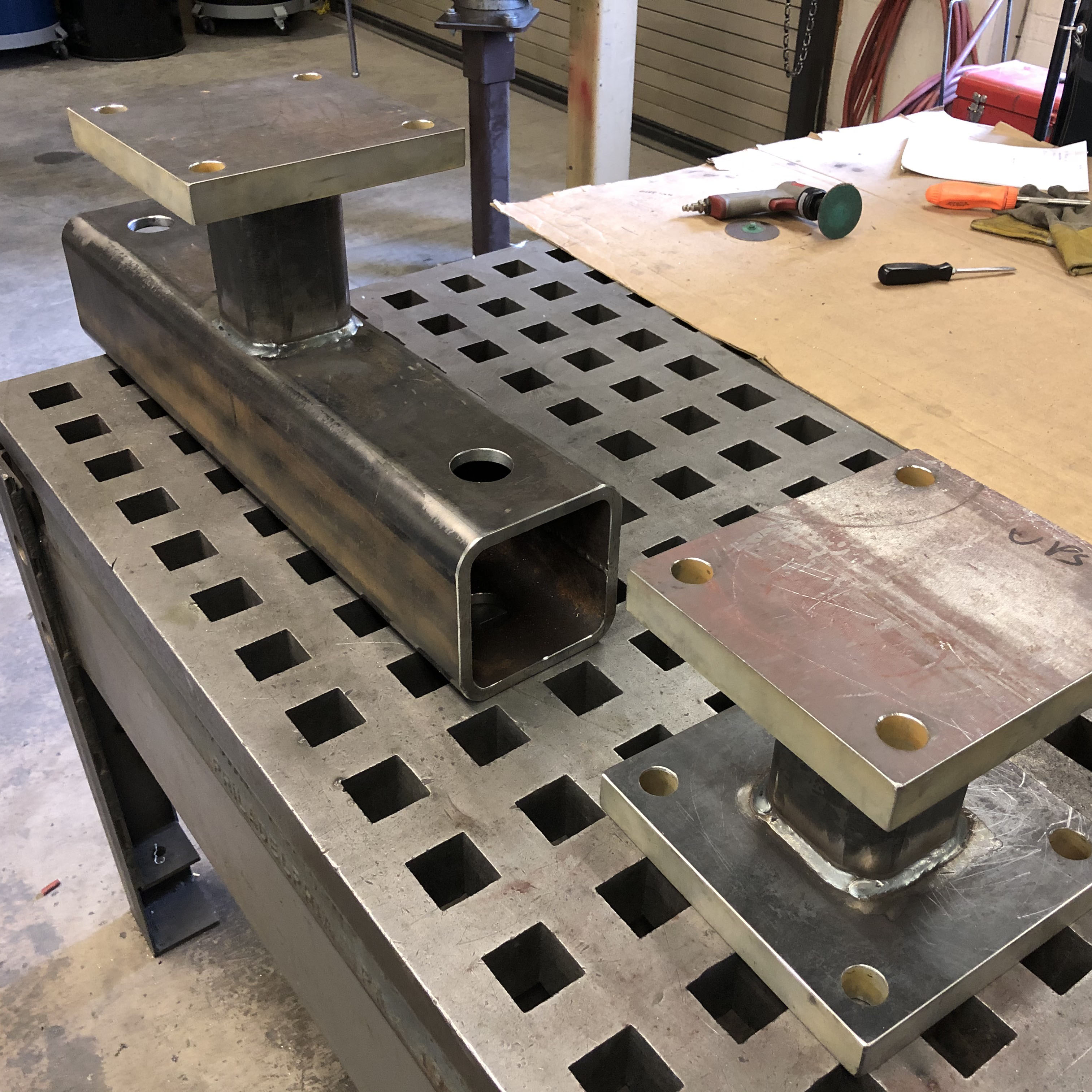 Heavy structural tubing fixtures for Civil Engineering load frame testing