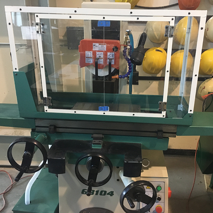 Polycarbonate enclosure & painted steel frame for faculty’s lab surface grinder