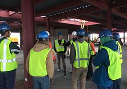Architectural engineering students tour the High Bay construction site.