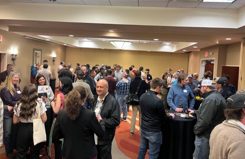 Construction management students and faculty mingle with industry representatives during a once-per-semester Evening with Industry event.