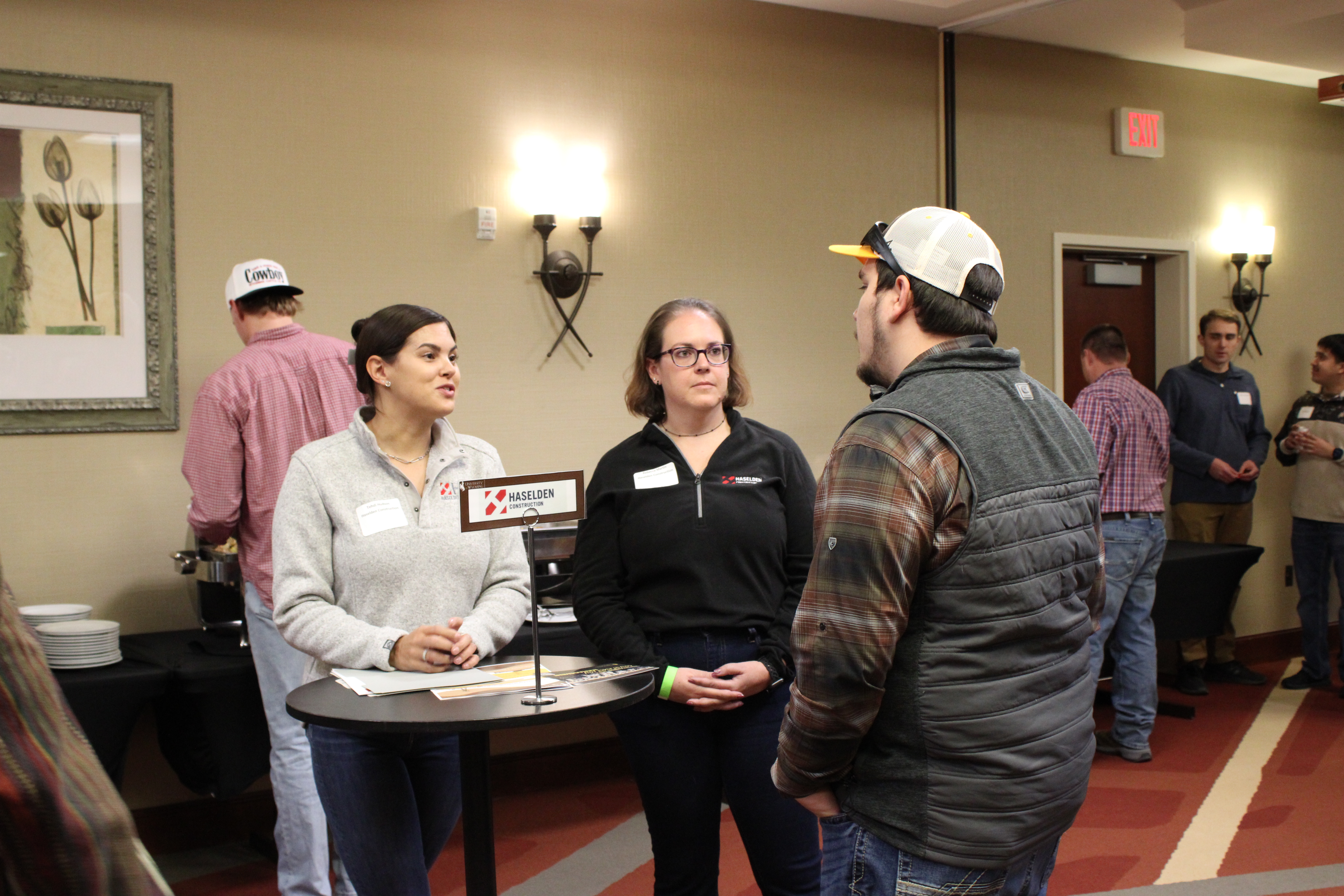 Evening with Industry event spring 2025. Students, faculty, and industry representatives mingle in a hotel event space.