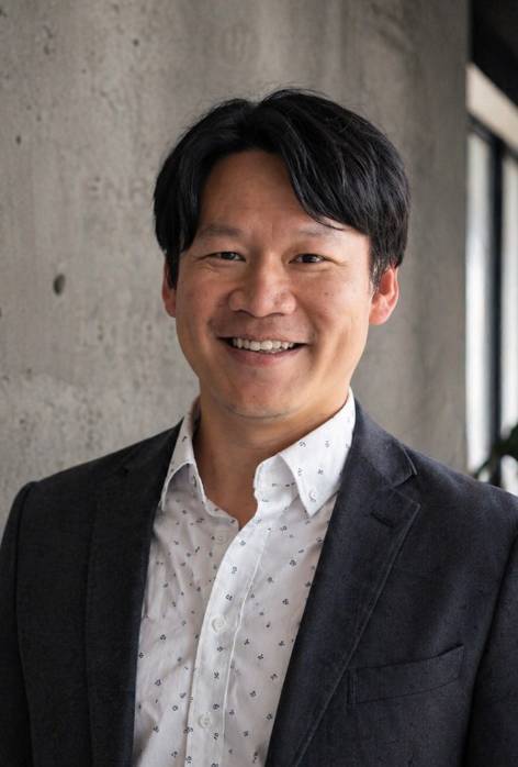 Tran Duong Nguyen smiling at the camera