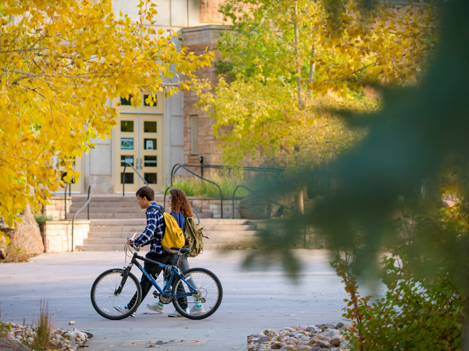 Students walking in front of college of education building