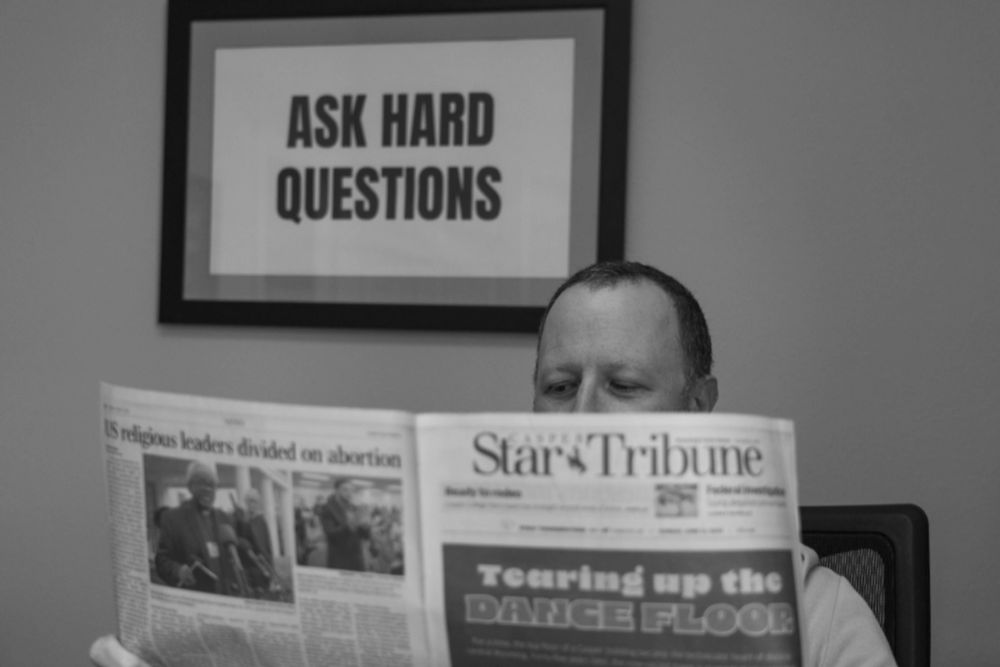 A man reading a newspaper
