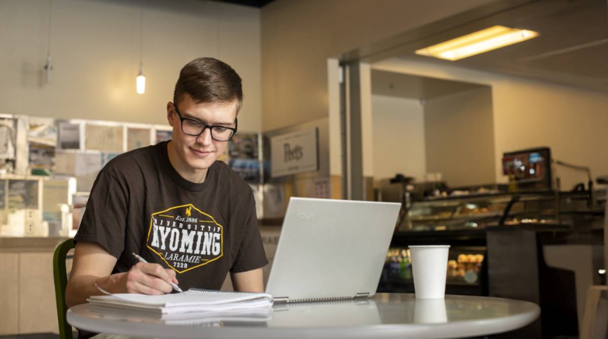 A student studying at a cafe