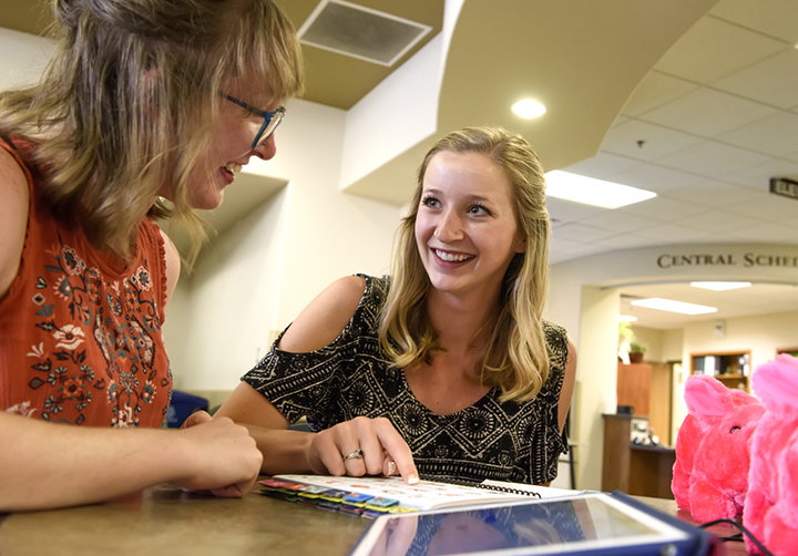 Communication Disorders student working with a faculty member. 