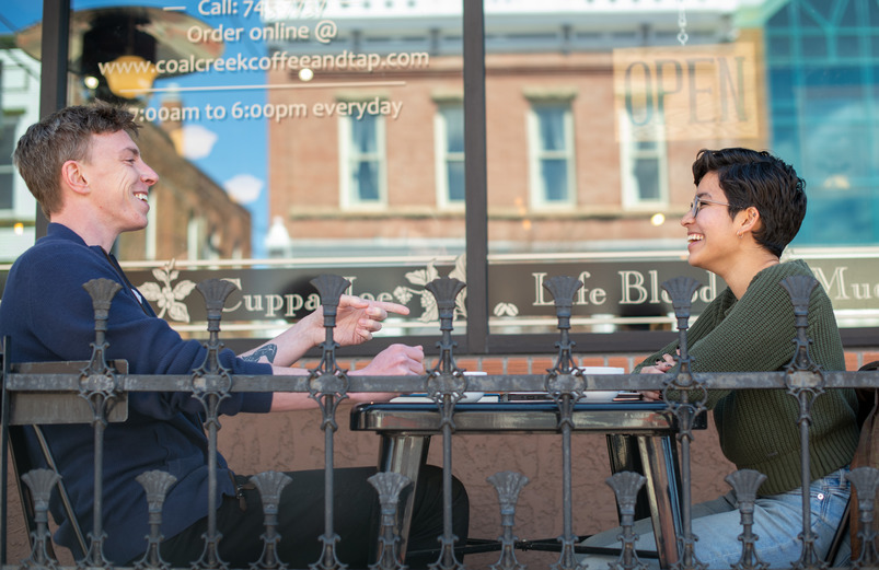 Alumni of the MFA program share coffee in Laramie