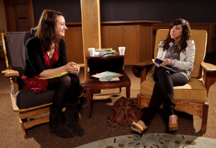 Two MFA students visit in the Carriage House