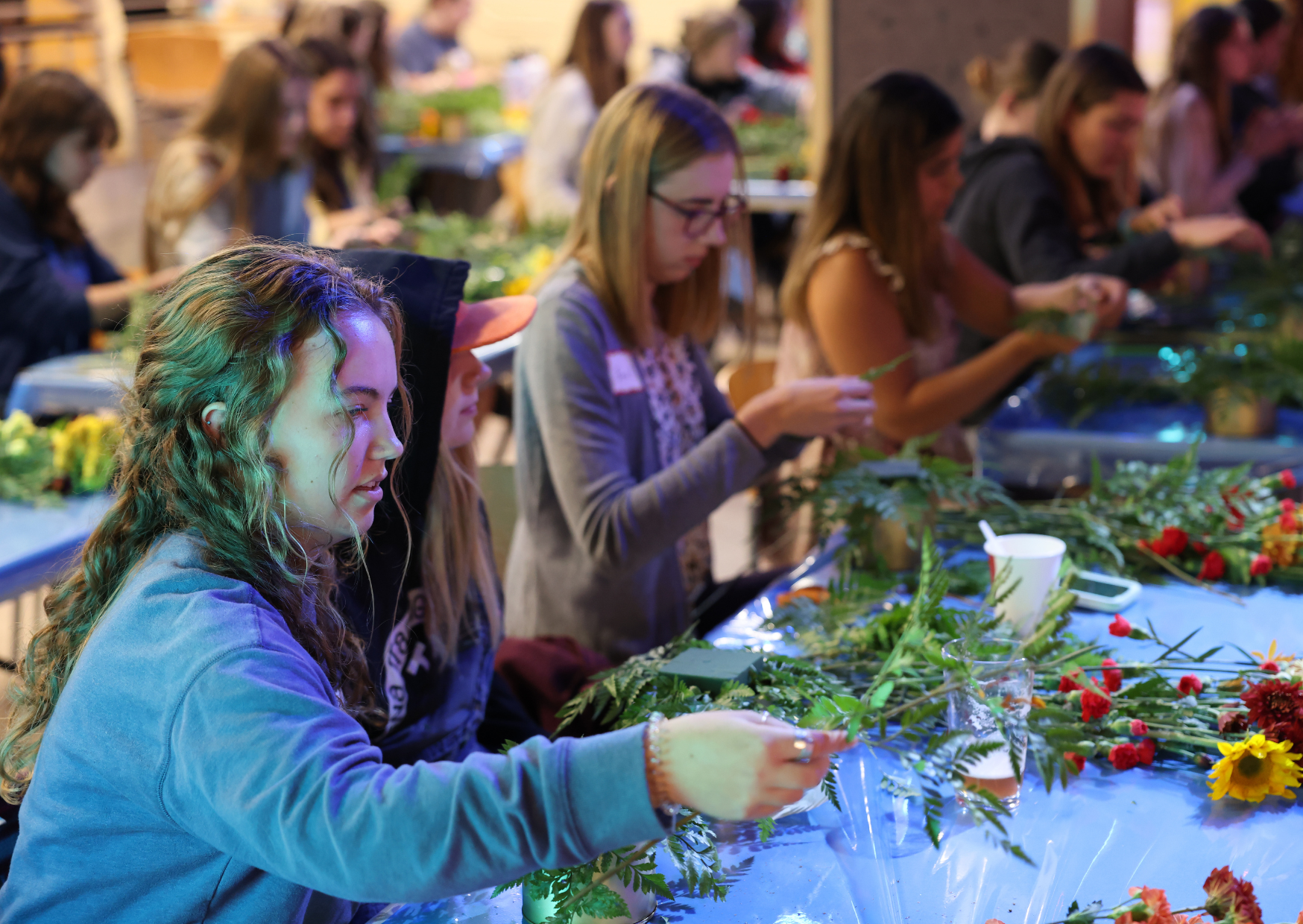 students at a flower arrangement event