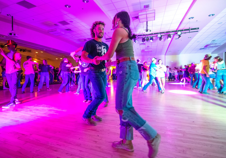UW students swing dance at a Union After Dark event by 7220 Entertainment