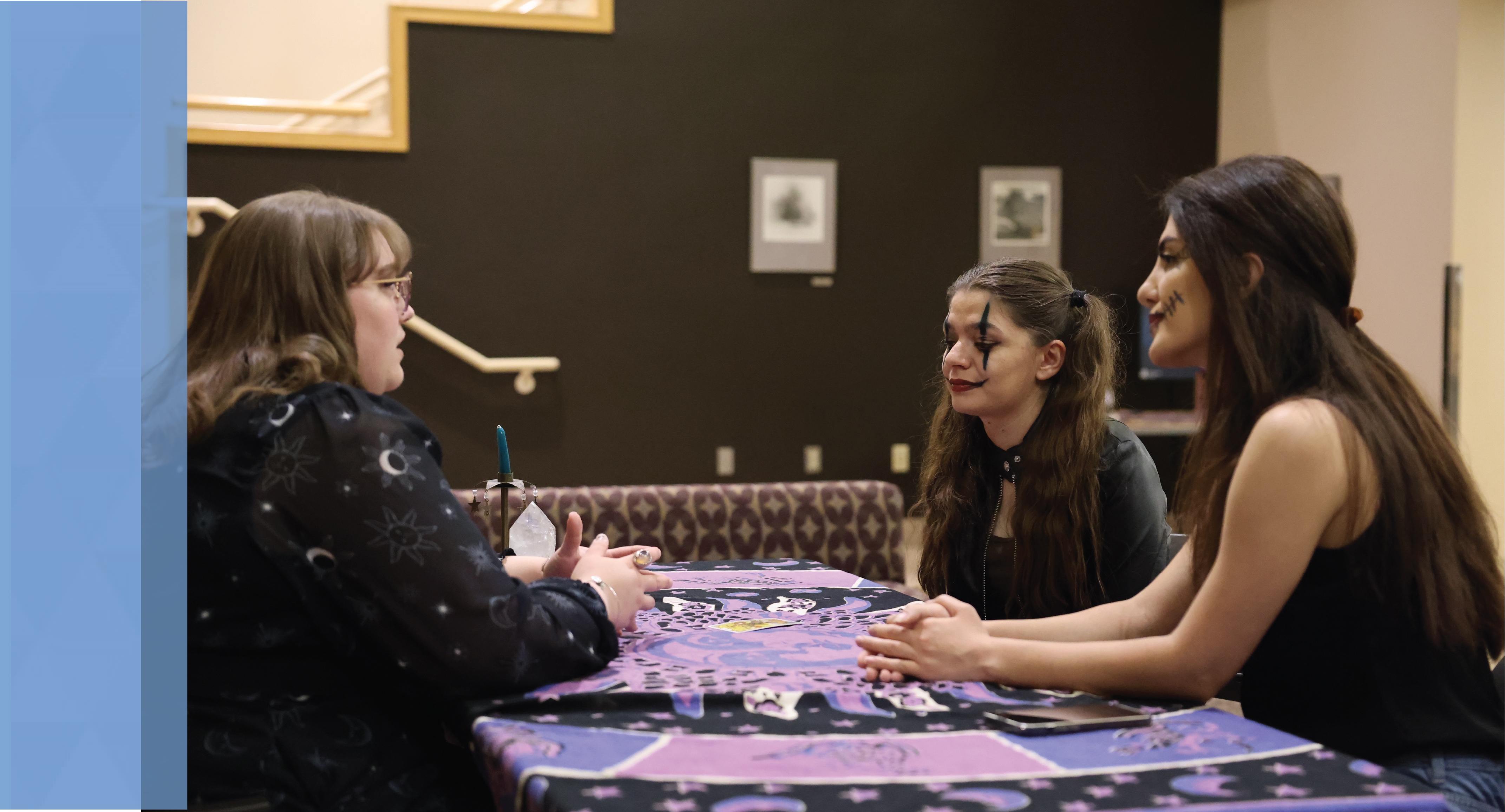 students getting a psychic reading during halloween