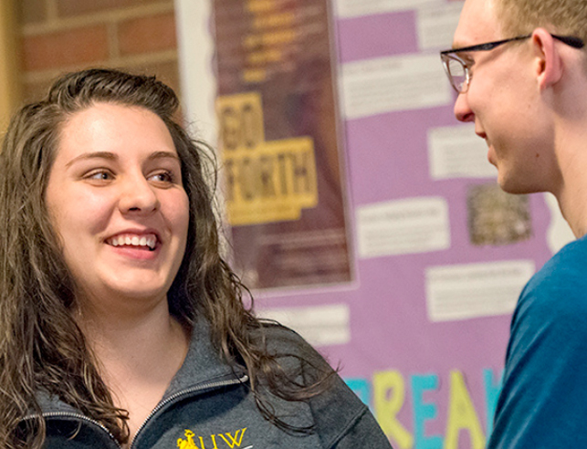 Advisor and student talking