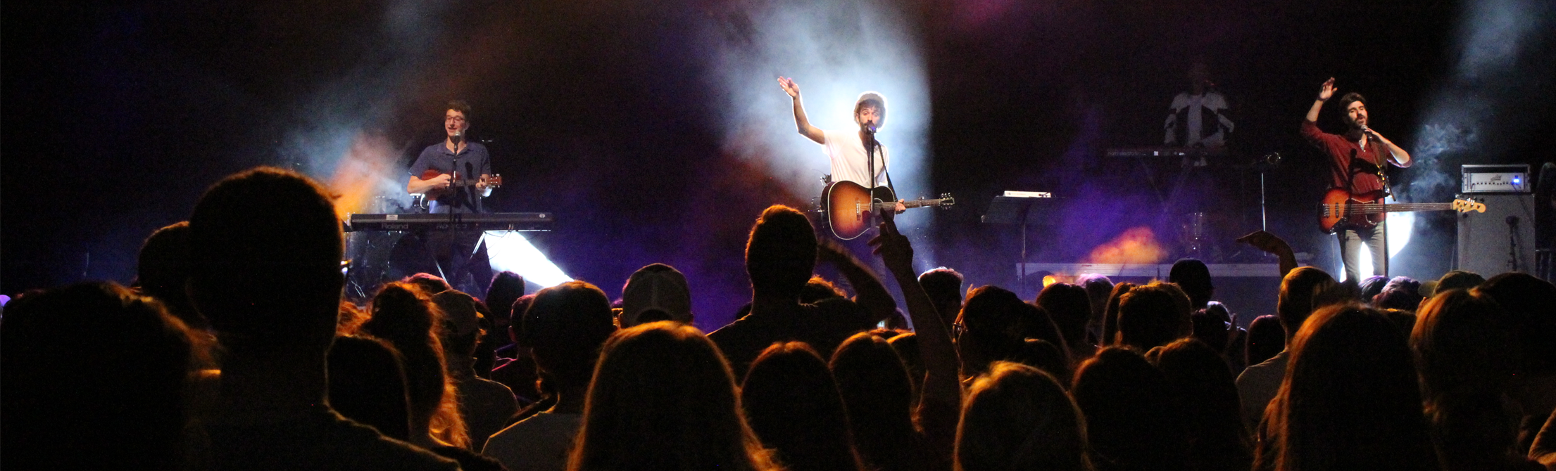 AJR band performing on stage