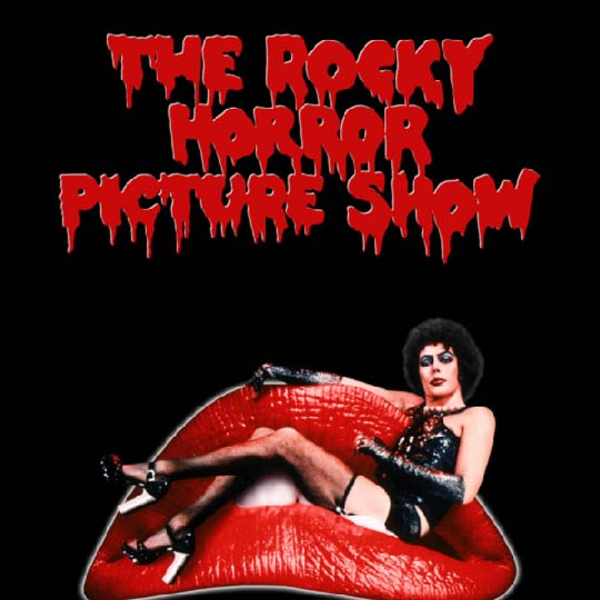 Image of rocky horror movie poster person sitting on set of lips with lipstick 