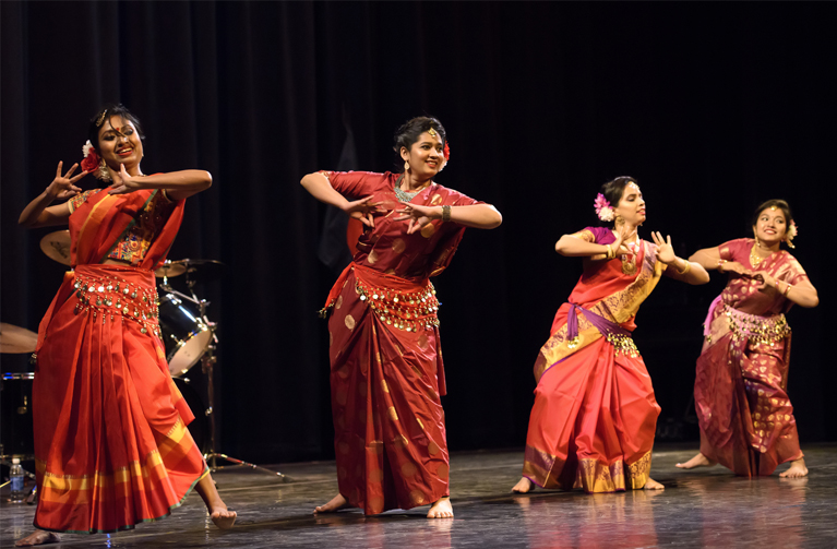 four women dancing