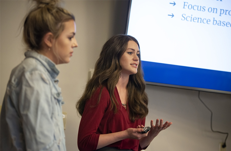 two women speaking