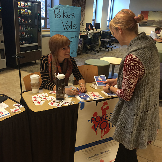 Students discussing voting