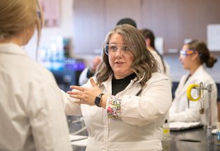 A UW faculty member provides instruction during a lab at the University of Wyoming.
