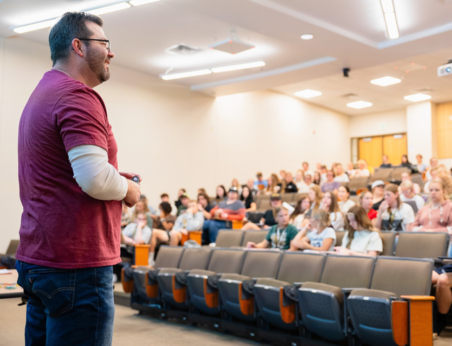 A professor at the University of Wyoming teaches a class
